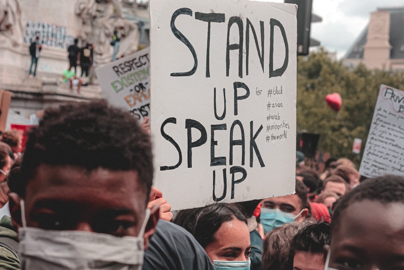 An image that shows a climate protest on a college campus.