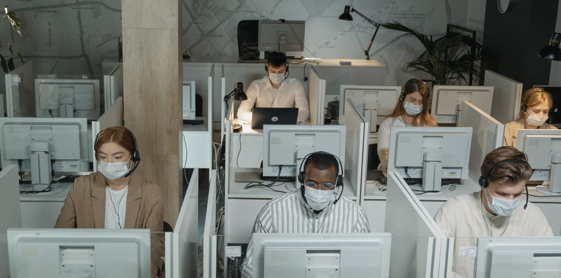 An image shows people wearing masks during Covid-19.