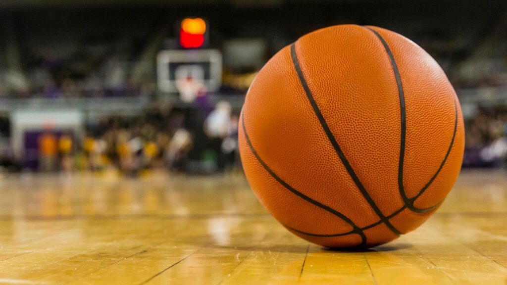 An image of a basketball during March Madness. How is March Madness related to climate change? Our blog finds some common threads that might resonate with endowment managers and trustees.